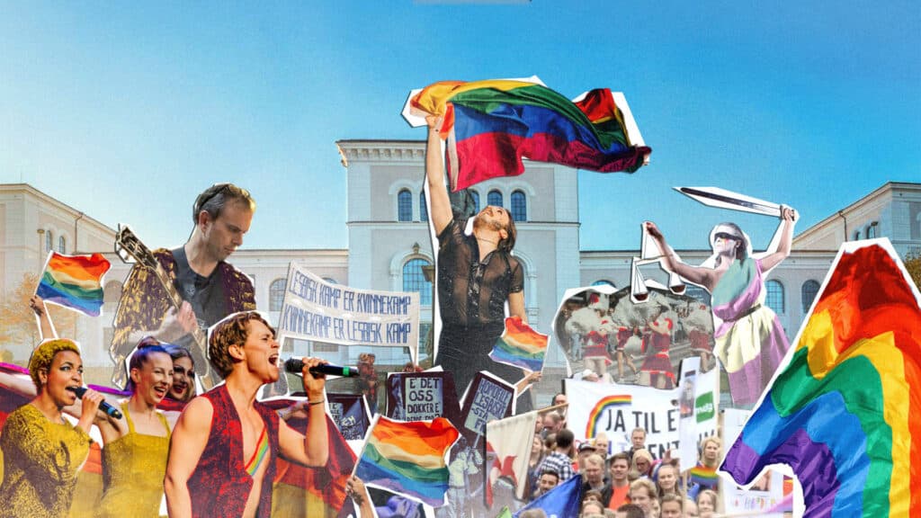 En livlig folkemengde holder regnbueflagg og synger foran en stor bygning under et LGBTQ+ pride-arrangement, og noen holder skilt og bannere.